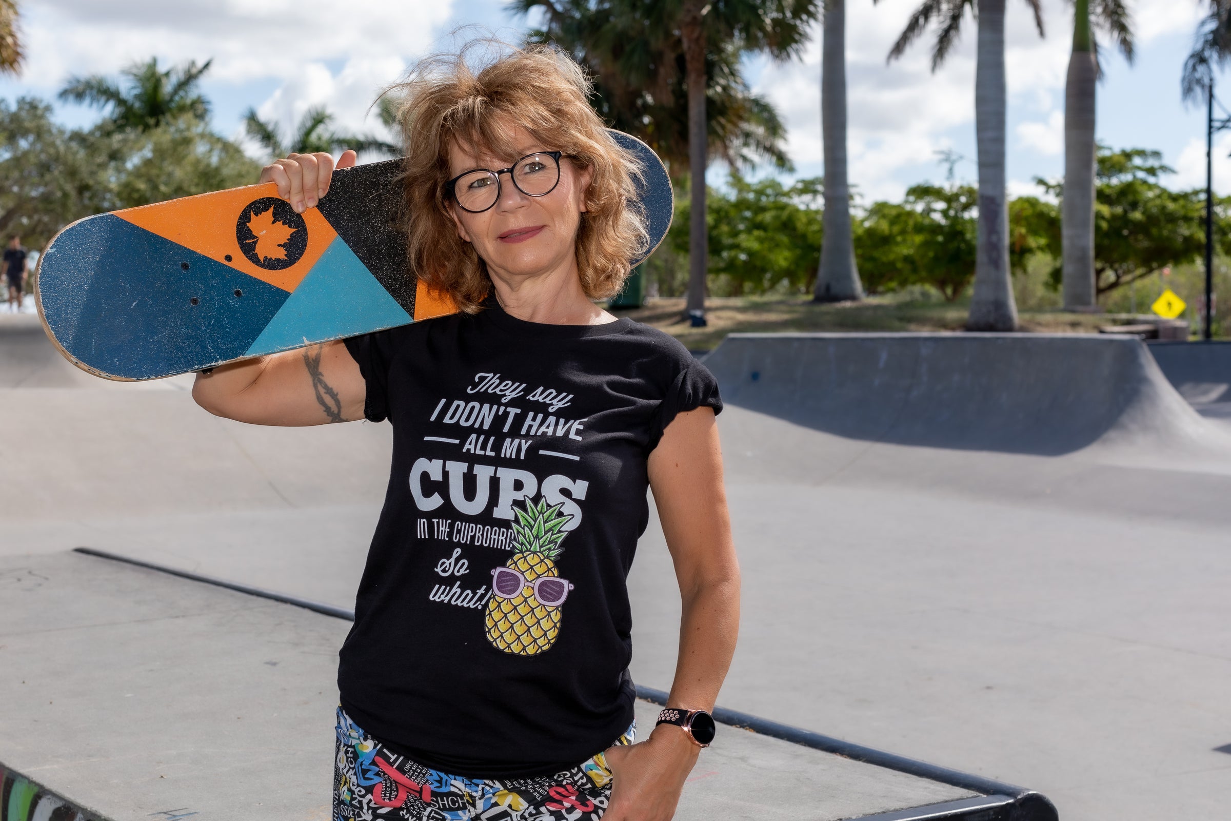 older woman with skateboard